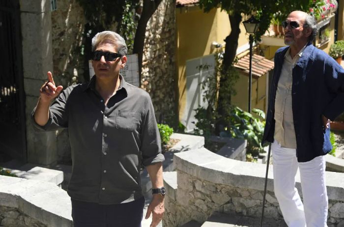 Dominic and Bert are seen outside the Castello degli Schiavi.