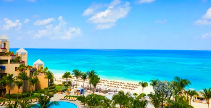 The Ritz-Carlton, Grand Cayman is the iconic jewel of the shoreline.