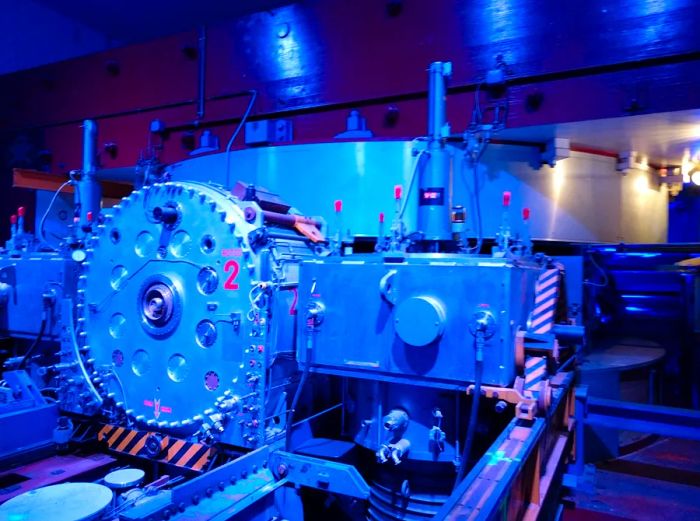 CERN's inaugural particle accelerator, the synchrocyclotron, which was installed in 1957, illuminated in blue.