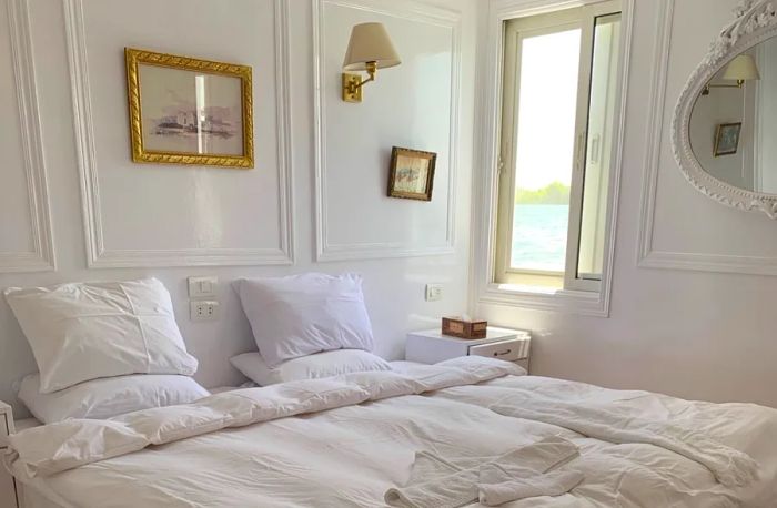 Interior view of a bedroom on a dahabiya Nile cruise