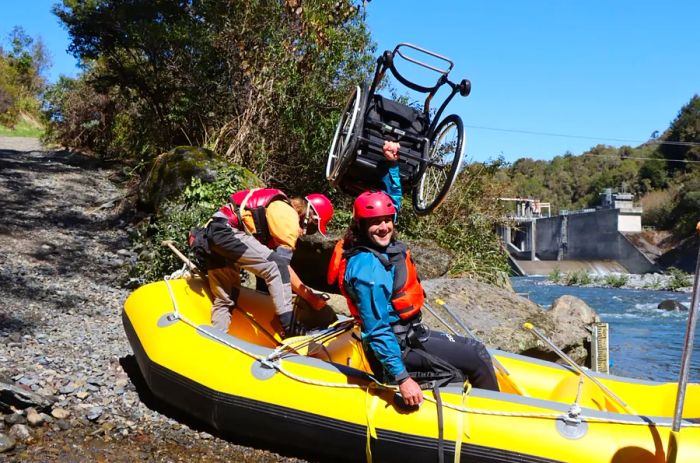 Participants gearing up for a Makingtrax adventure on New Zealand's Tongariro River.