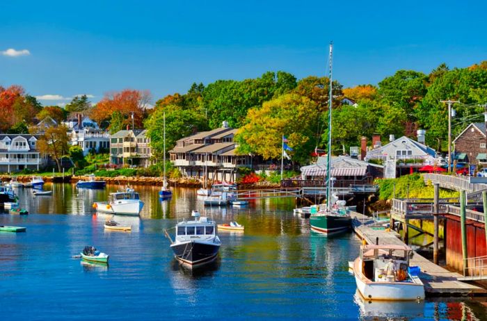 Colorful fishing boats moored in Perkins Cove, Ogunquit on a sunny day