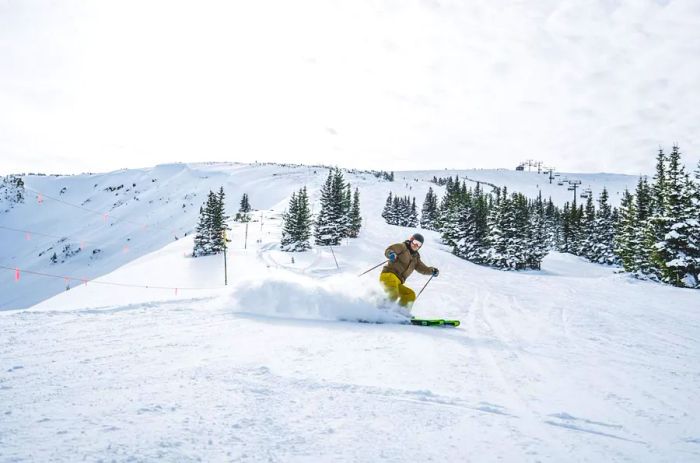 A skier making their way down a slope in Winter Park, Colorado