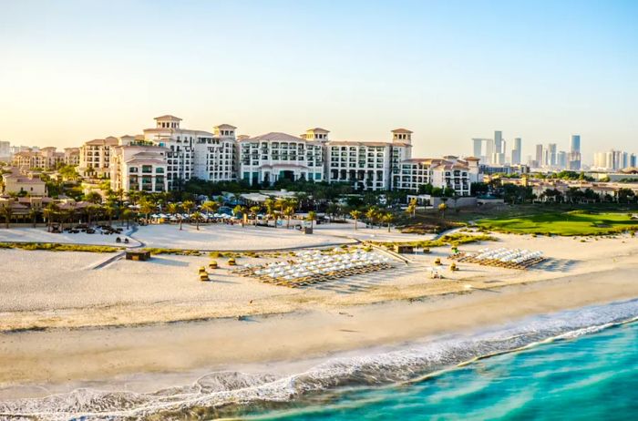 St. Regis Saadiyat Island Resort overlooks a private beach with crystal-clear waters.