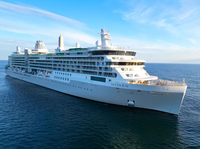 A stunning exterior view of the Silver Ray, a luxurious Silversea cruise ship, sailing on the ocean