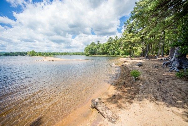 Forests and shorelines frame the coasts of Sebago Lake State Park in Sebago, Maine.