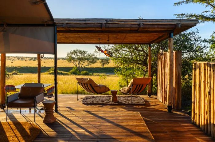 Singita Mara River Tented Camp boasts spacious outdoor decks, perfect for wildlife observation.