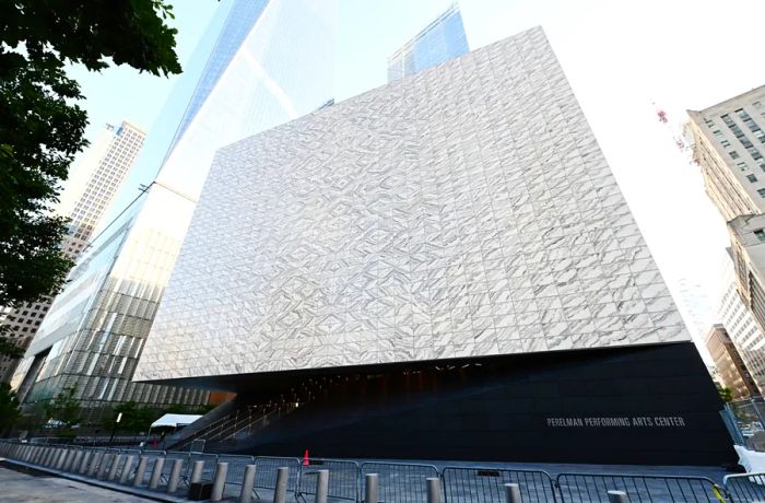 The exterior of the Perelman Performing Arts Center, a striking marble-clad cube