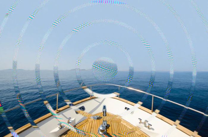 An image capturing the bow of a ship with a distorted circular filter to mimic the effects of motion sickness.