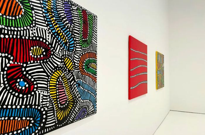 Three paintings from Kusama's series 