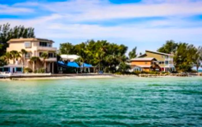 Charming homes lining the shore of Anna Maria Island, offering stunning views of the Gulf of Mexico in Florida. (Photo by csfotoimages / Getty Images)