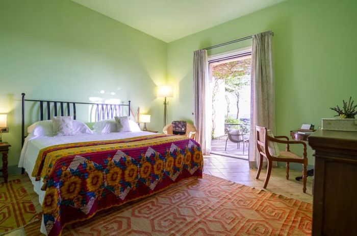 This guest room at La Foresteria features a private terrace.