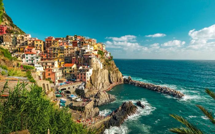 A vibrant village perched on a hilltop by the sea.