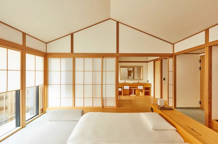 Interior of the guest room at Azumi Setoda, featuring a white design with light wood accents