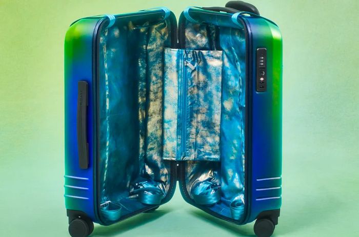 Vibrant interior of an Amanda Wachob x Roam Limited Edition suitcase