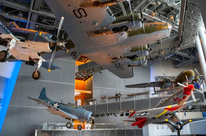 Wartime aircraft suspended from the ceiling at the National World War II Museum in New Orleans