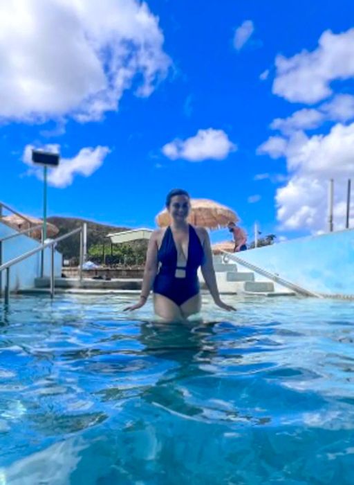 Jen Ruiz, a participant in United Voices, enjoying a swim at Coamo Hot Springs