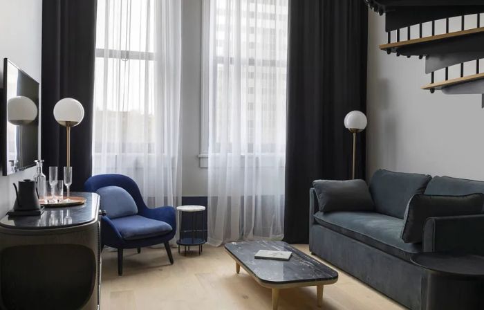 Interior view of a guest room at Woodlark Hotel