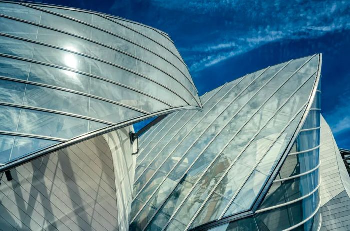 The modern, angular glass façade of the Fondation Louis Vuitton.