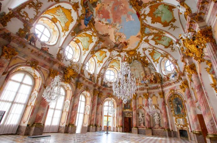 The lavishly adorned and golden Imperial Hall of the Residence Palace in Würzburg, Germany