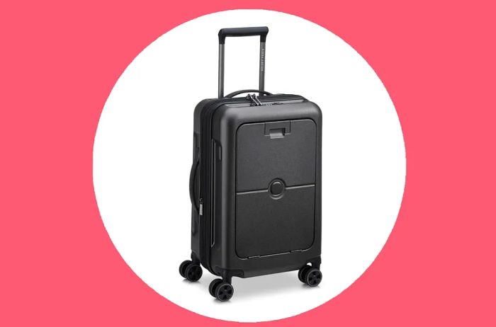 Black hard-shell carry-on featuring a laptop pocket