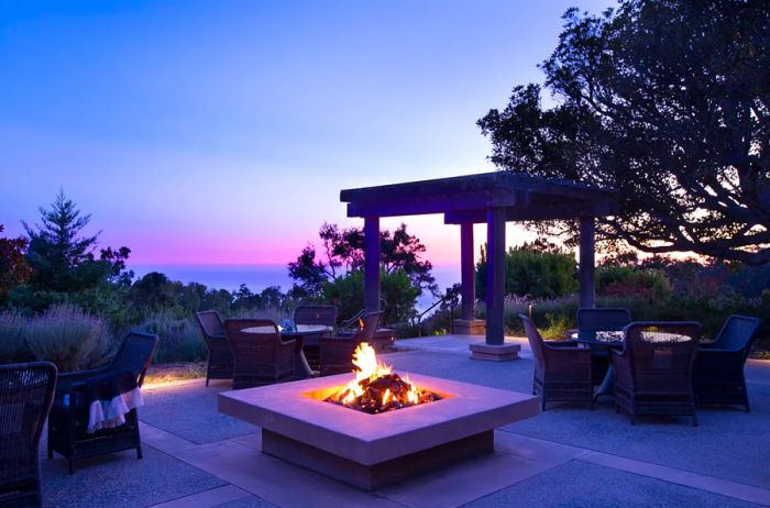 Glowing firepit at sunset at Alila Ventana Big Sur