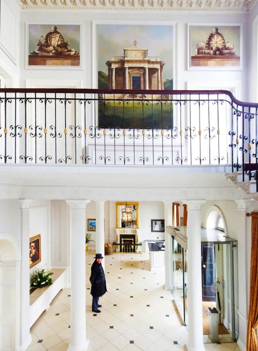 The communal areas of the Merrion Hotel in Dublin are adorned with wrought iron balconies and impressive artwork that graces the walls.