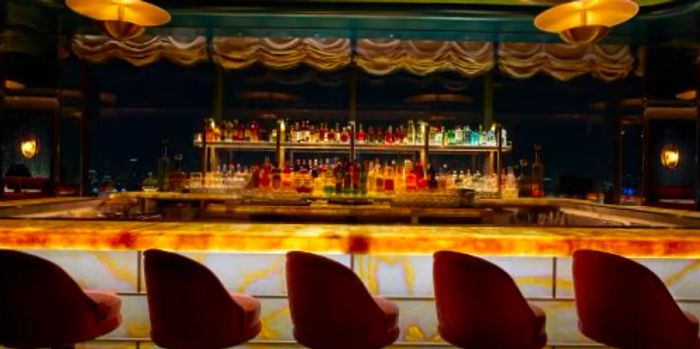 Nubeluz, located atop the new Ritz Carlton NoMad, features a bar crafted from onyx and illuminated with LED lights.