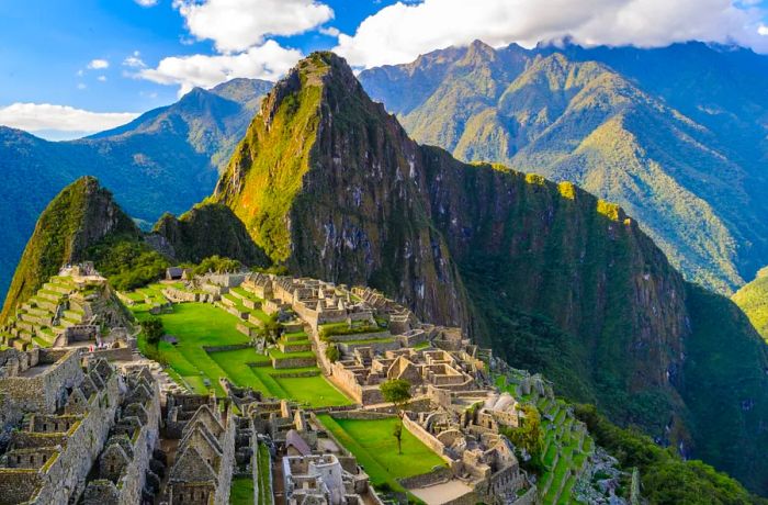 Machu Picchu, a UNESCO World Heritage site, set against a stunning mountain backdrop.