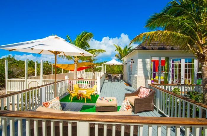 An outdoor patio at the kids club at the Shore Club in Turks and Caicos, featuring child-sized seating and games.