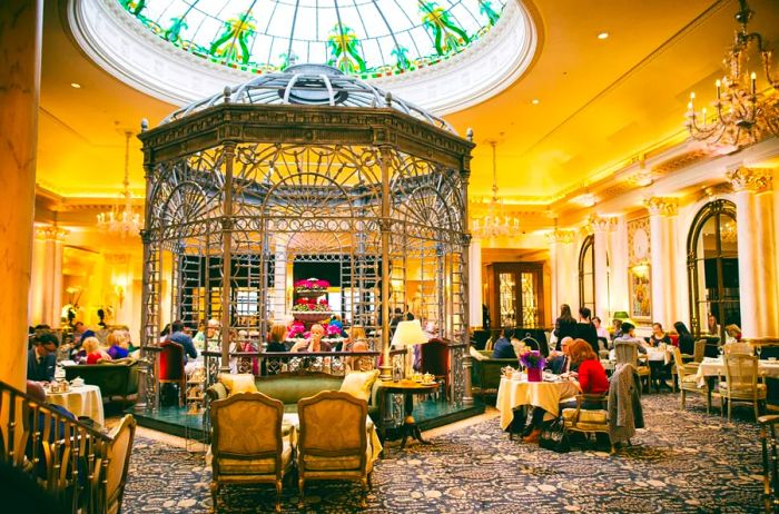 A dining area adorned with a domed glass ceiling and exquisite decor