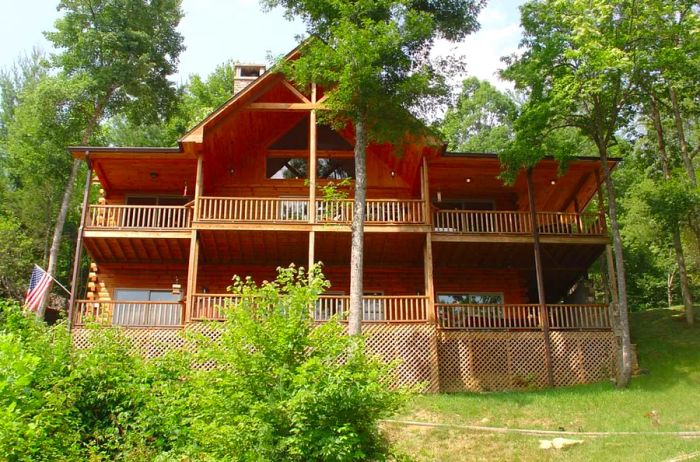 View of a two-story log cabin in Topton, North Carolina, spacious enough for two families of four