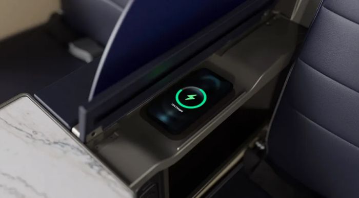 Detail view of the new wireless charging feature in United's first-class seats.