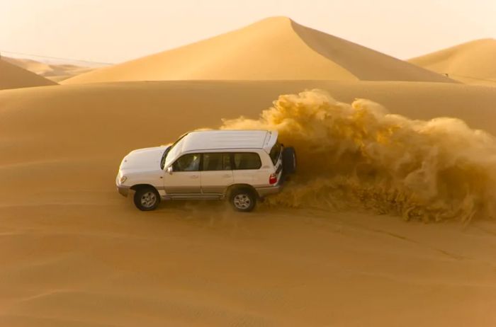 Driving through the dunes just outside of Doha