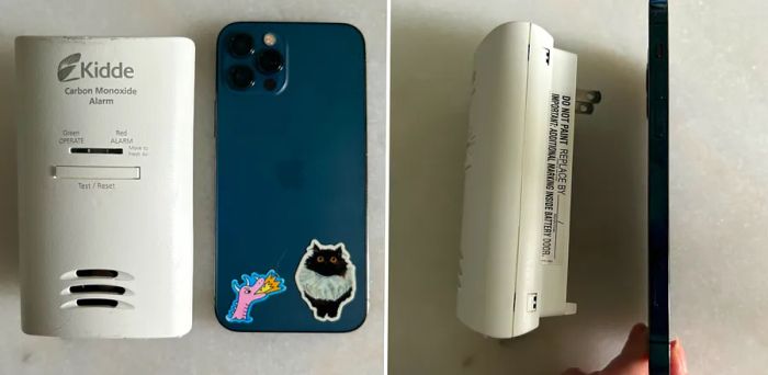 A travel carbon monoxide detector placed next to a smartphone for size comparison