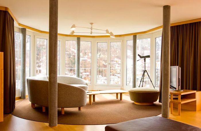 A Tower suite at the Omnia in Zermatt, featuring hardwood floors and breathtaking mountain views
