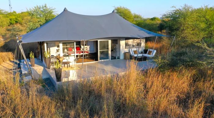 View of a spacious tent and deck at Suján Jawai in Rajasthan.