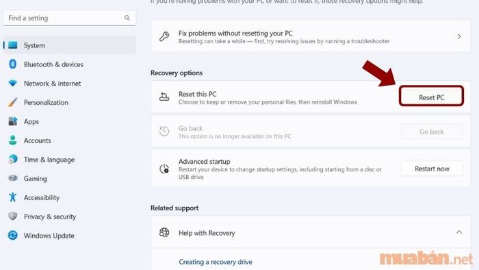 Nhấn vào nút Reset PC.