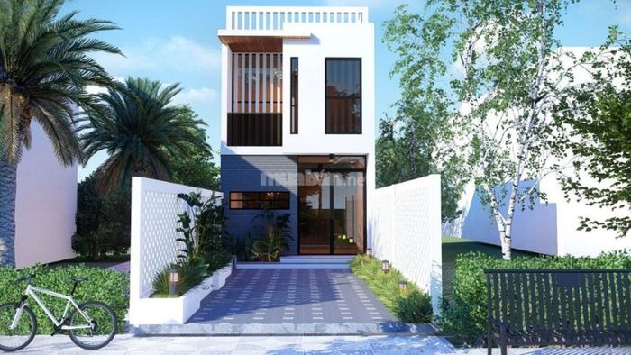Nhà mặt tiền ống 2 tầng với giếng trời