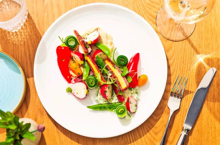 Savor farm-to-table dishes with a Mediterranean twist at Good Ground Tavern