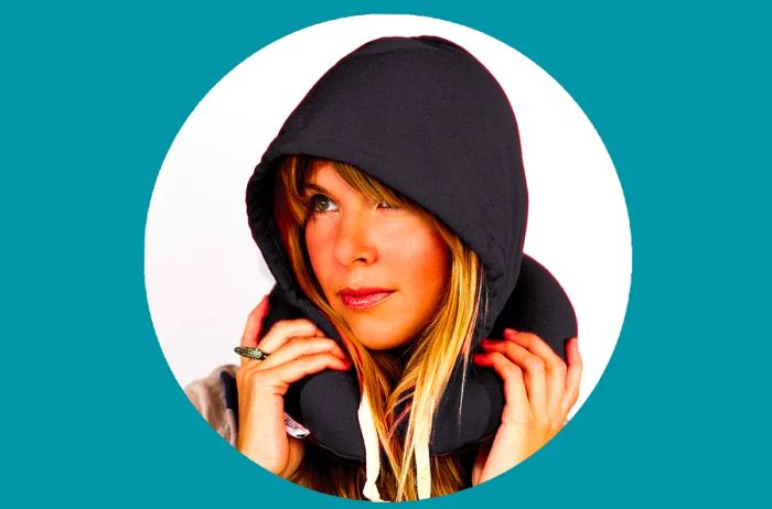 It combines the functions of a neck pillow and a sleep mask in one.
