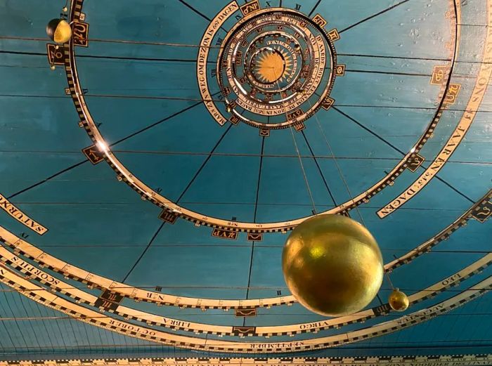 Close-up of an 18th-century mechanical model of the solar system