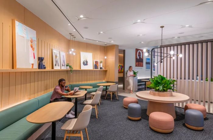 A single guest enjoying a table at the DFW Capital One Lounge