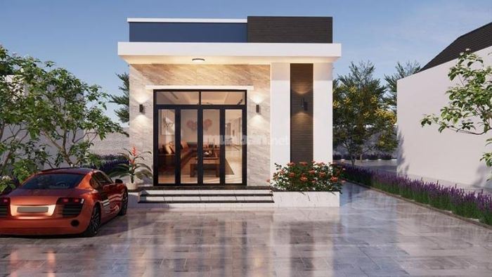 Mặt bên ngôi nhà cấp 4 mái tôn với cửa sổ lớn để đón ánh sáng tự nhiên