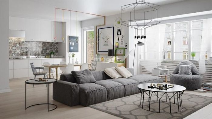 Điểm nhấn của phong cách Scandinavian trong thiết kế phòng khách là sự hiện diện của sofa có màu sắc trung tính và bàn gỗ sáng màu.