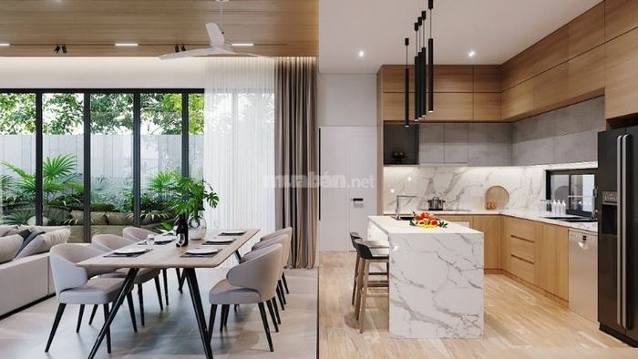 Phòng khách kết hợp với bếp liền mạch tạo không gian thông thoáng và rộng rãi.
