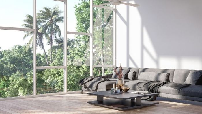 Việc bố trí cây xanh kết hợp với cửa kính lớn tạo ra không gian rộng rãi và thoáng mát.