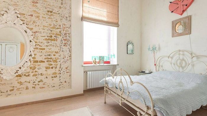 Phòng ngủ thiết kế theo phong cách tối giản, với bố cục hài hòa và không gian thoáng đãng