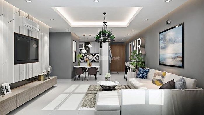 Phòng khách chung cư mang vẻ đẹp trang nhã với các tông màu sáng, tạo không gian thoáng đãng.