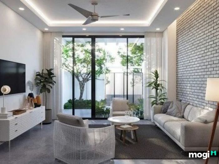 Phòng khách nhà ống 4m được thiết kế theo phong cách gần gũi với thiên nhiên, tạo nên không gian sống thoáng đãng và tươi mới.
